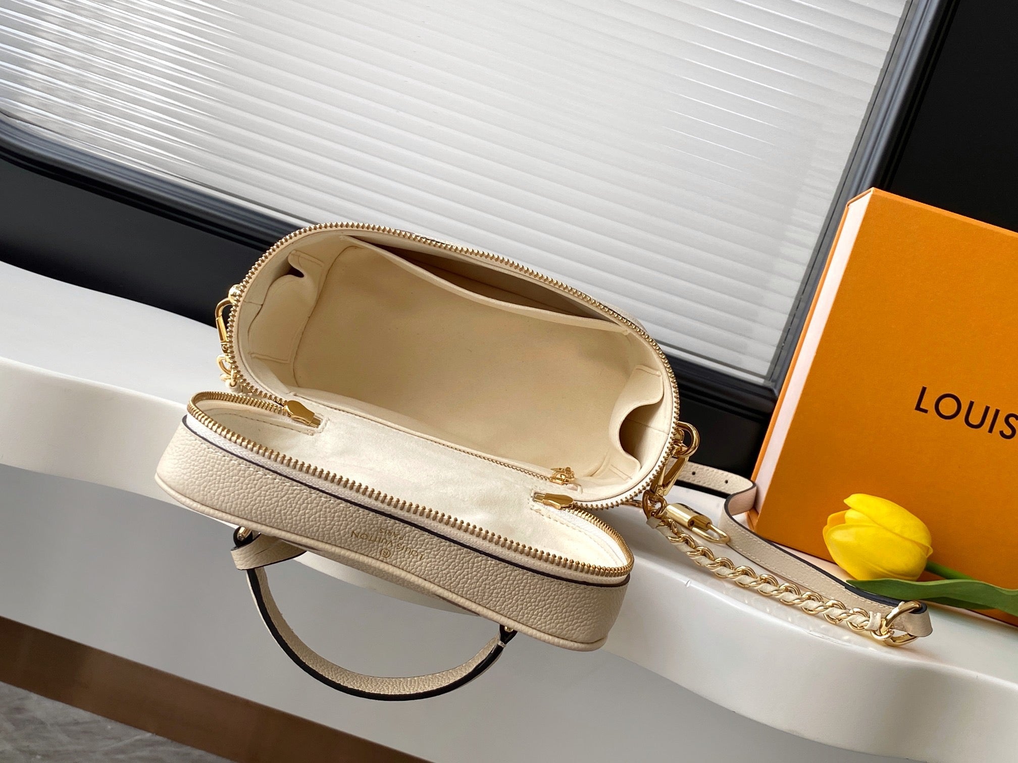 Louis Vuitton Migo Vintage Collection