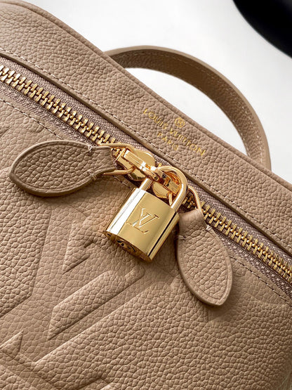 Louis Vuitton Migo Vintage Collection