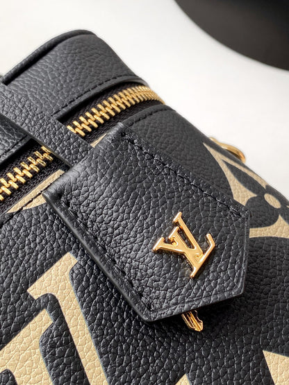 Louis Vuitton Migo Vintage Collection