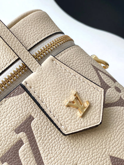 Louis Vuitton Migo Vintage Collection