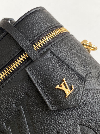 Louis Vuitton Migo Vintage Collection