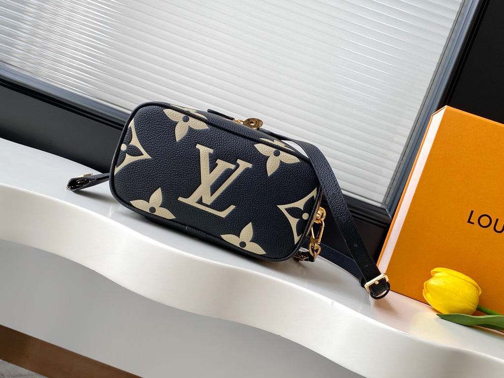 Louis Vuitton Migo Vintage Collection