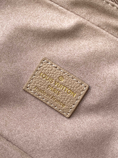 Louis Vuitton Migo Vintage Collection