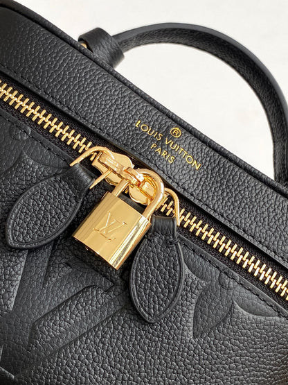 Louis Vuitton Migo Vintage Collection